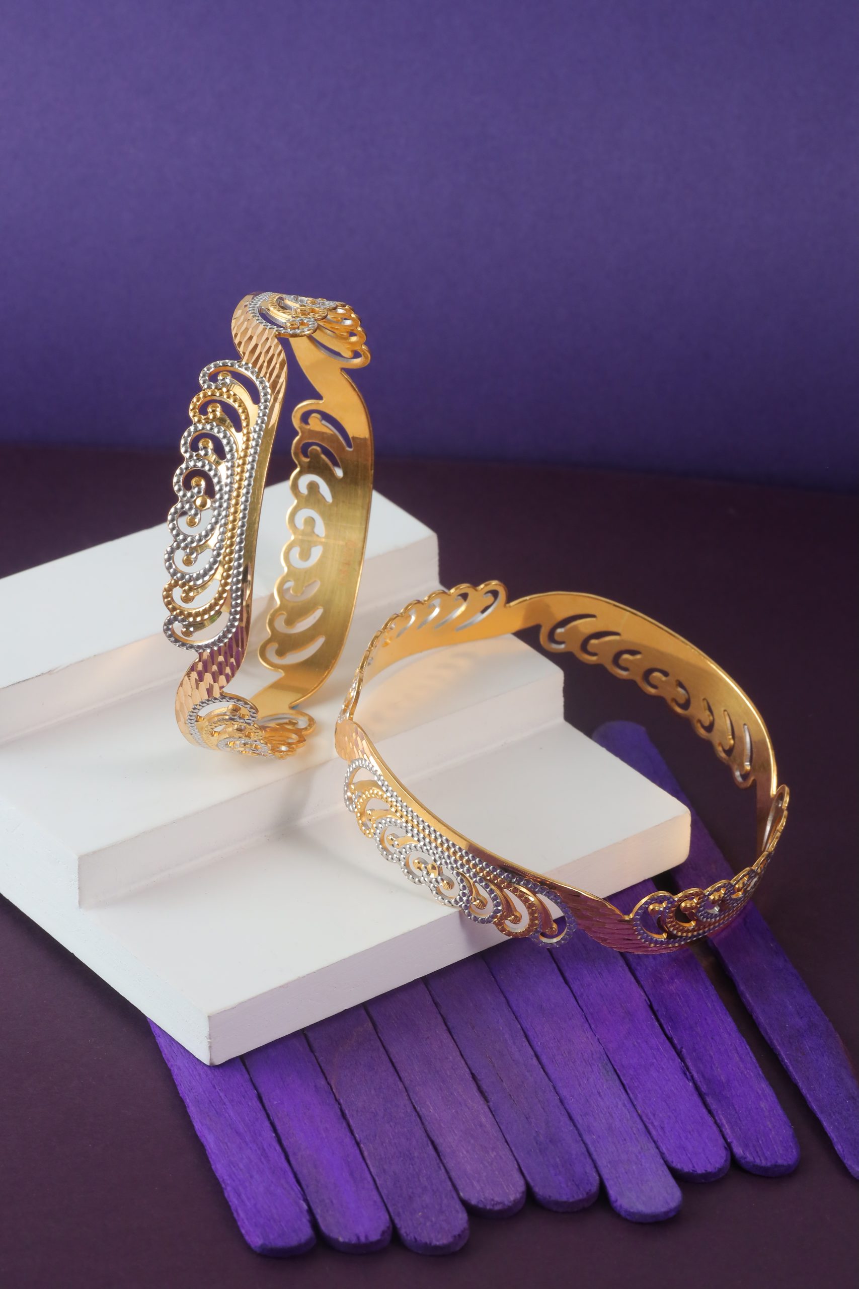 Meta Title (60 characters): Amara Swirl CNC Gold Bangles – Precision and Timeless Elegance