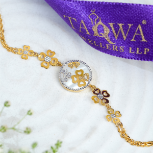Quadglow 18kt gold bracelet by Taqwa Jewellers with four-heart clover clusters on a pearled medallion and dual-tone chain links.