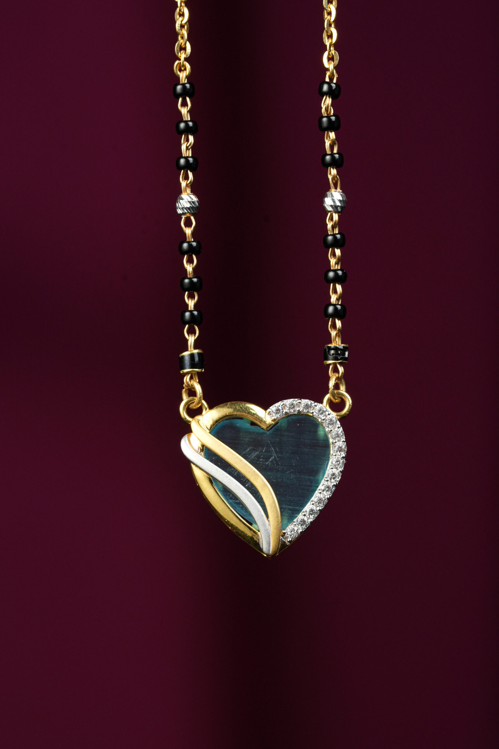 Eternal Love Heart Mangalsutra – 18KT Gold & Diamond Elegance