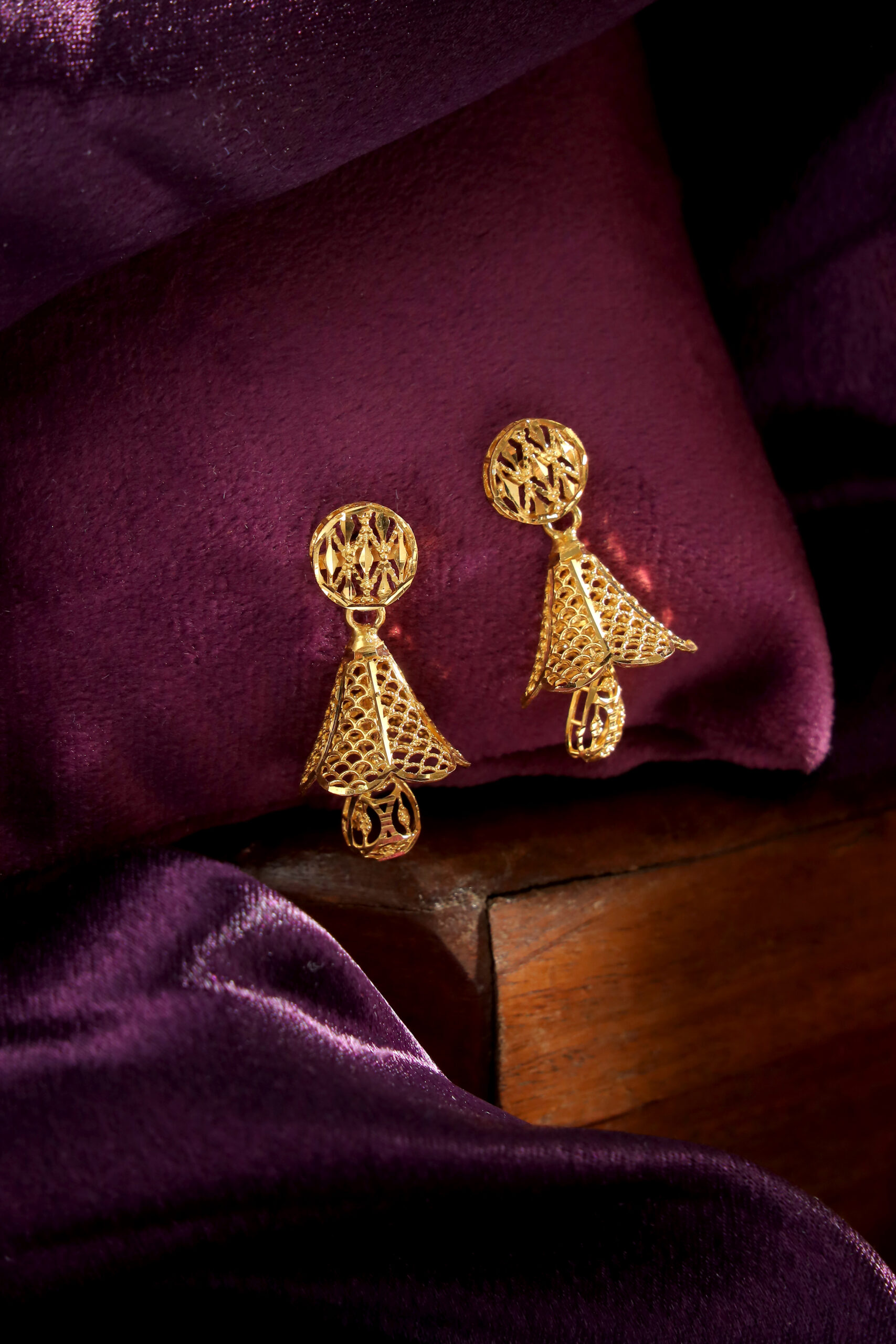 Golden Drape Earrings – A Silhouette of Sophistication