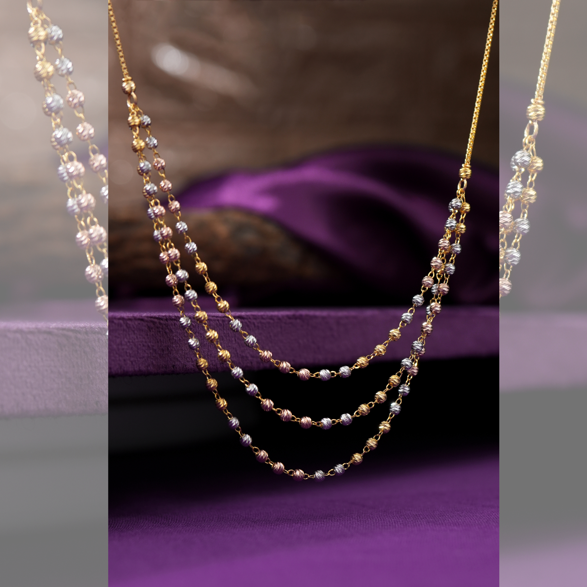 Mawj Gold Chain by Taqwa Jewellers, a three-layer 18KT chain with yellow gold, rose gold and rhodium beads.