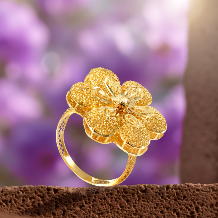 Petalcraft 18KT gold ring, a fancy flower ring with six mesh-textured petals and a raised ribbed centre, by Taqwa Jewellers