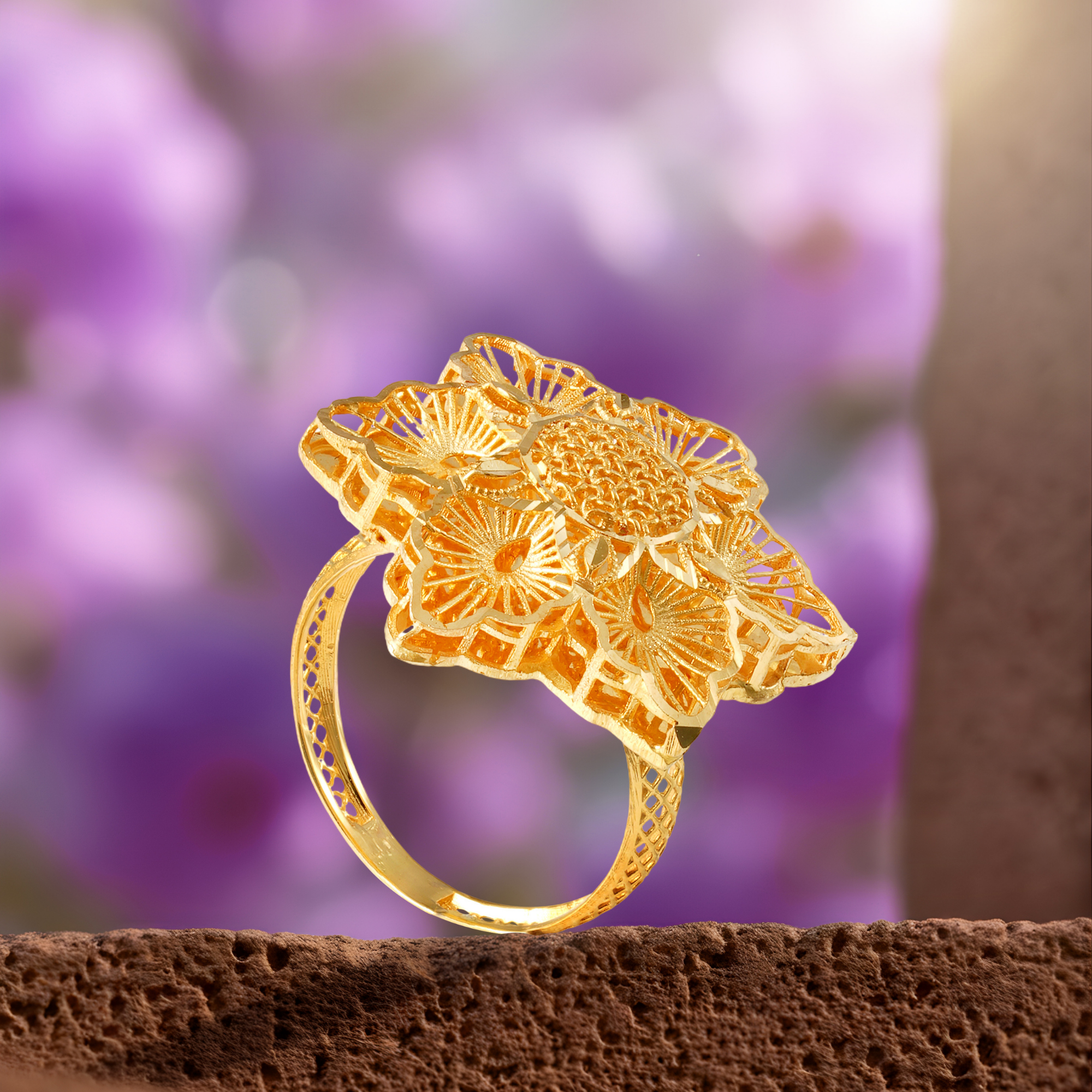 Iznik Turkish 18KT gold ring with six jaali petals, sunburst filigree and a centre of gold ballwork by Taqwa Jewellers.