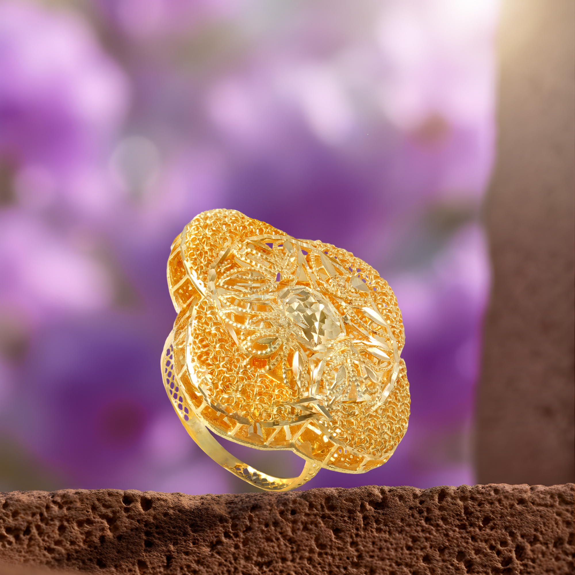 Intrica Turkish 18KT gold ring with ultra-fine jaali, a diamond-cut oval centrepiece and a laser-cut band, by Taqwa Jewellers