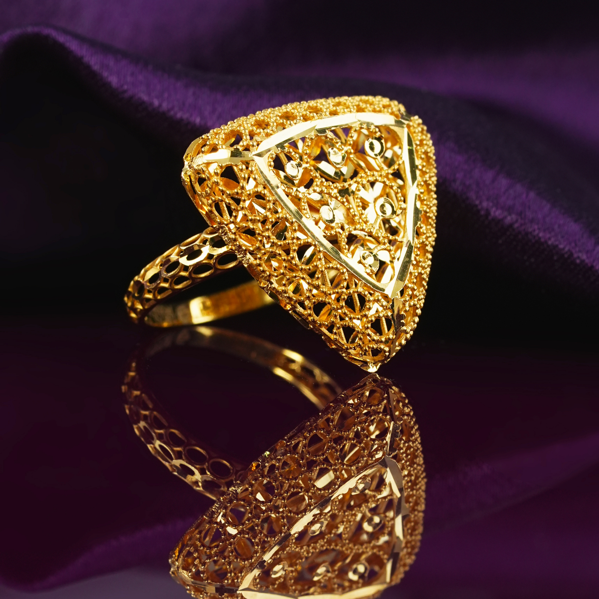 Kafes Turkish 18kt gold ring with triangular mesh latticework top, circular filigree and openwork band.