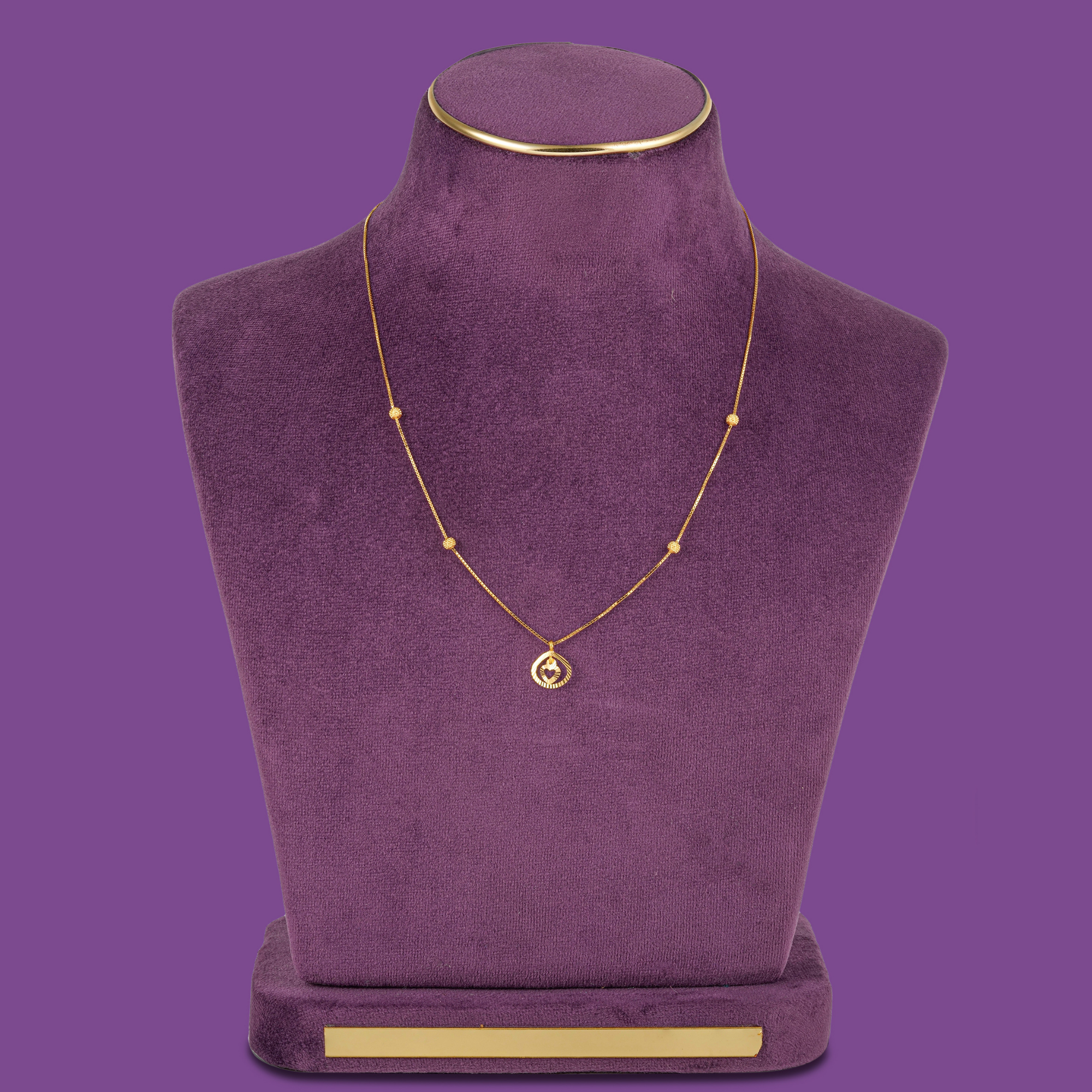 Cherish Gold Chain, a 22KT gold box chain with four textured beads and a round heart pendant, by Taqwa Jewellers.