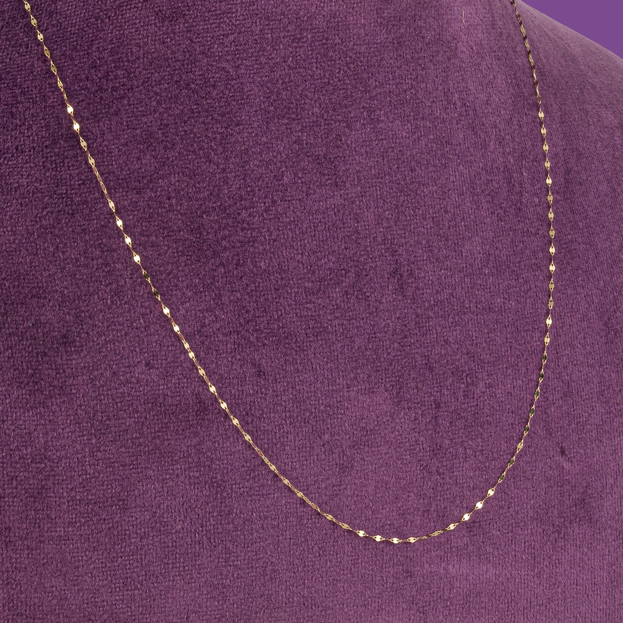 Flicker 18KT gold chain, a plain ultra-lightweight sequin chain with flat links, by Taqwa Jewellers.