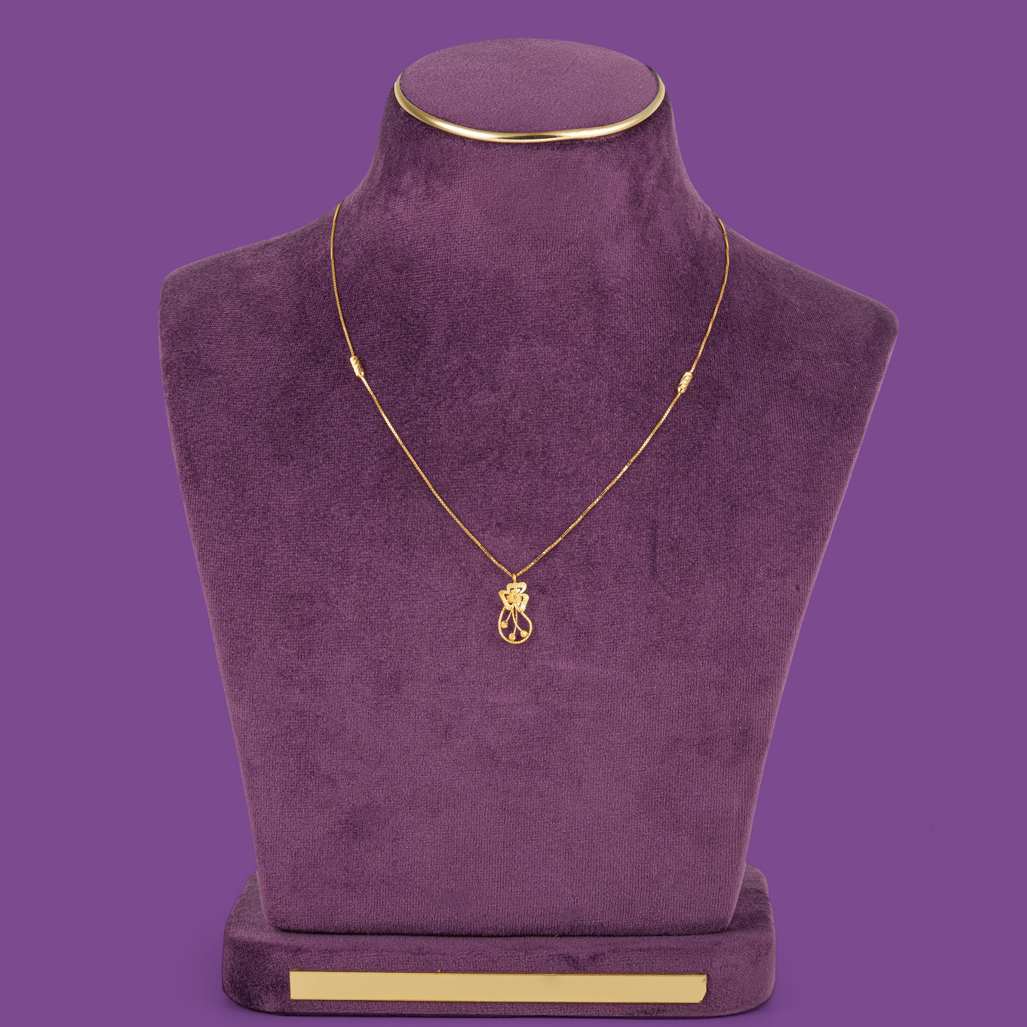 Lily 22KT Gold Chain - a gold box chain with an open-work floral pendant and two slanted-cut beads, by Taqwa Jewellers.