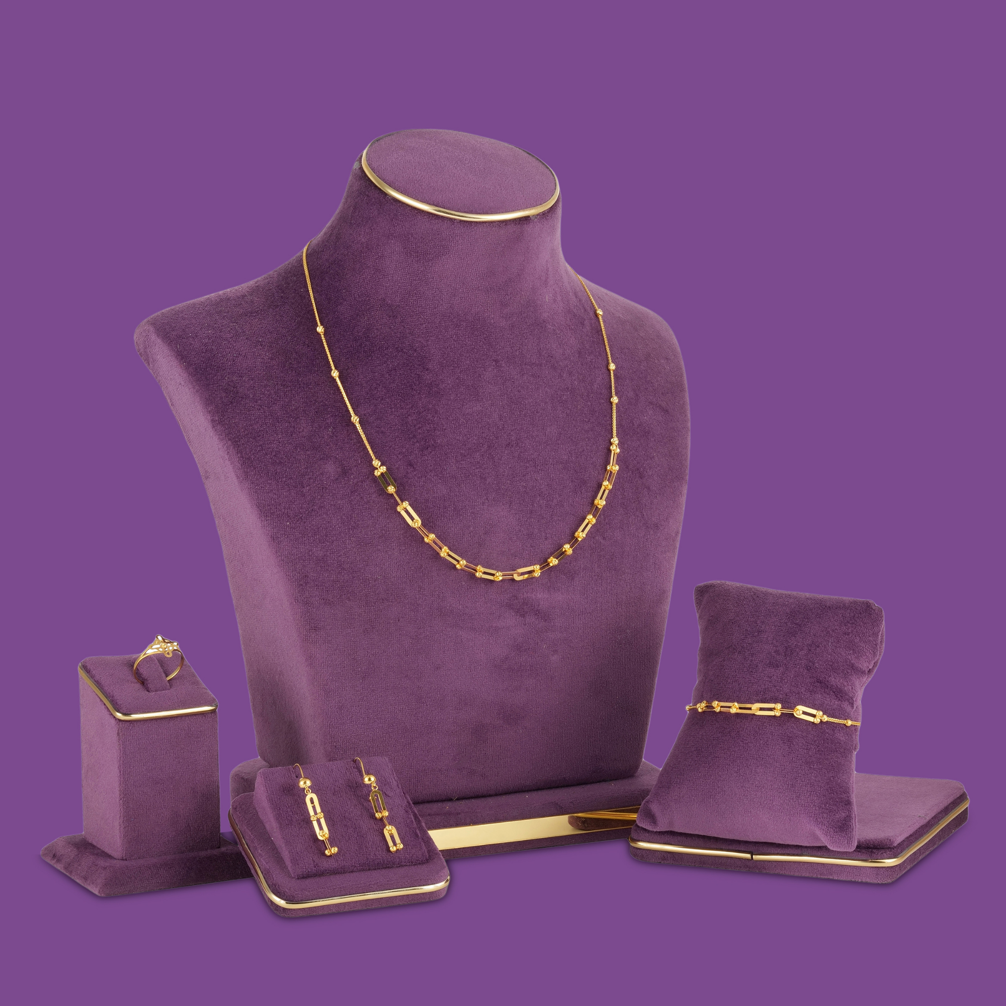 18KT yellow gold necklace set with bracelet, earrings and ring made of slim open links and cut gold beads.