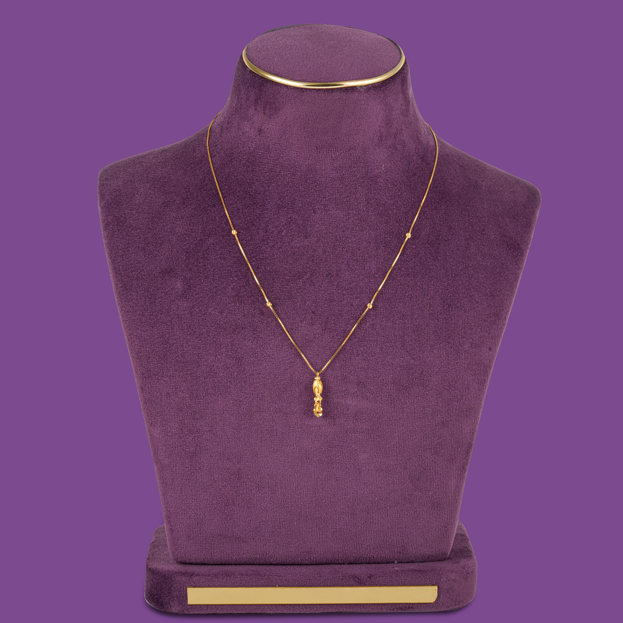 Tulip 22KT gold chain with four cut beads and a stacked bud and fluted flower pendant, by Taqwa Jewellers.