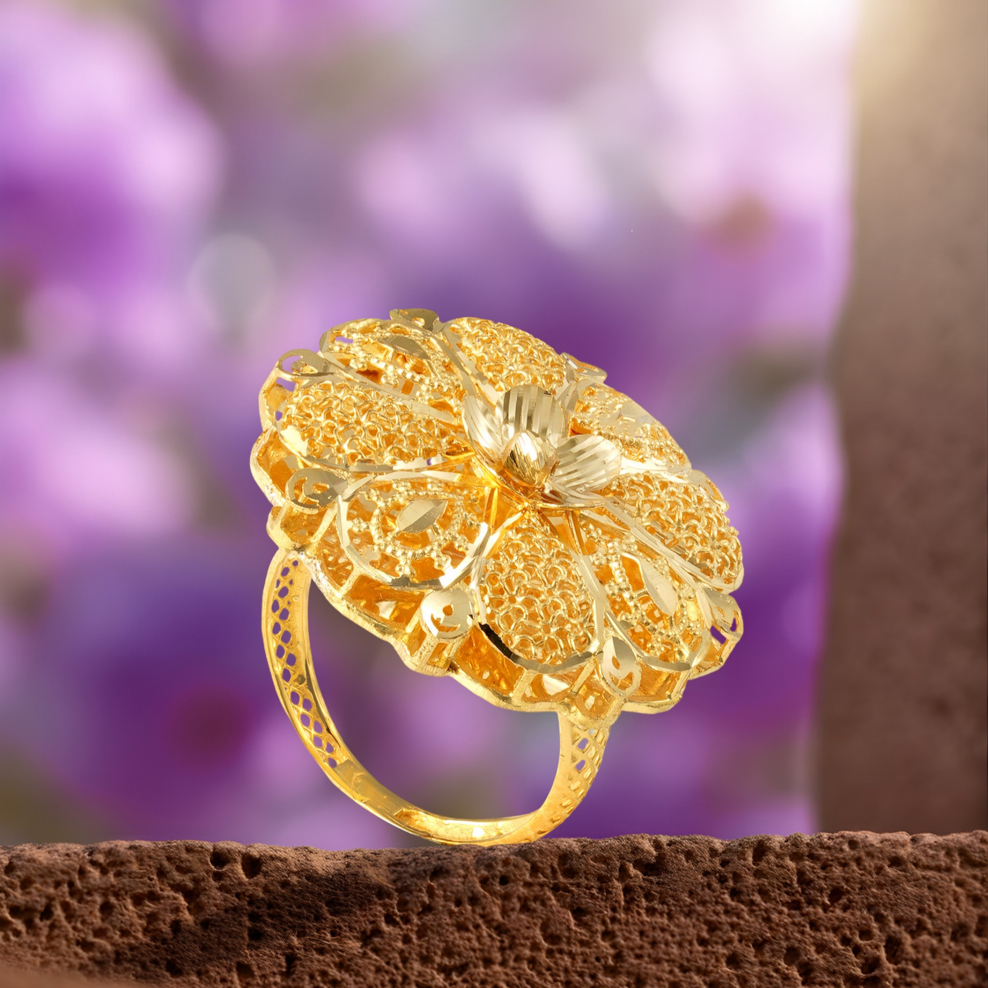 Nawar Arabic 18KT gold ring with a raised diamond-cut bloom, jaali petals and a cutwork band, by Taqwa Jewellers.